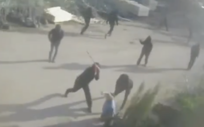 Security camera footage from the village of Deir Sharaf, near Nablus in the northern West Bank, shows two masked assailants beating a man with clubs as others flee, on January 8, 2026. (Used in accordance with Clause 27a of the Copyright Law)
